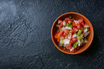 Typical Argentine Creole sauce. Made with bell peppers, tomato, onion, vinegar and oil.