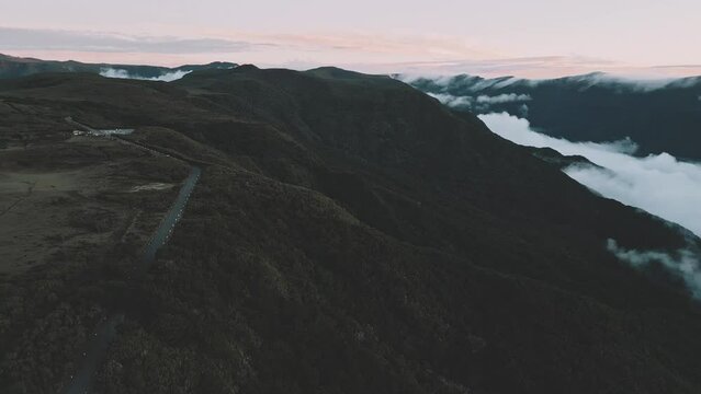 Aerial view of Fanal Forest, Madeira with a camera pan towards the mountains during blue hour
