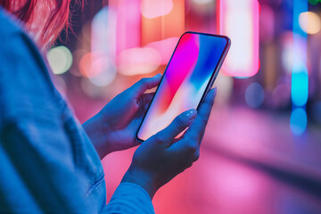 Young Woman Using Smartphone on City Street at Night. Generative AI.