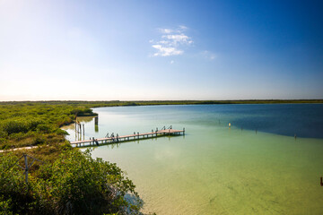 Muelle. Beautiful blue hole Kaan Luum lagoon in Tulum, Quintana Roo in Mexico. © Mylifeontopdm