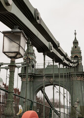 Fototapeta na wymiar Design Architecture of Hammersmith Bridge. One of the world's oldest suspension bridges and a major river crossing and primary route in west london, Space for text, Selective focus.