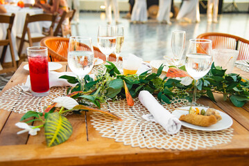A centerpiece is a central decorative object, often flowers, candles or fruit, and is an important part of the wedding reception decoration.