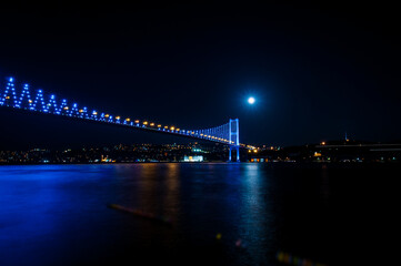 Fototapeta na wymiar İstanbul Bosphorus Bridge and city skyline at night.