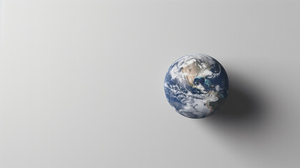  Earth globe on a plain white background for Earth Day. Holiday concept. Image for an environmental organization. Banner with copy space. 