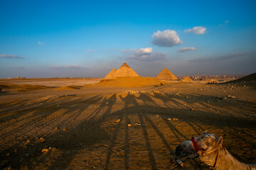 Pyramids of Giza, pyramid complex consist of three pyramids, Menkaure, Khafre or Chephren, and the Great Pyramid of Giza, the largest Egyptian pyramid served as the tomb of Pharaoh Khufu, Giza, Egypt