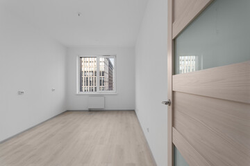 New empty apartment after renovation with city view

