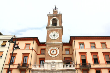 Fototapeta na wymiar Clock Tower (or Torre dell' Orologio) at Piazza Tre Martiri in Rimini, Italy