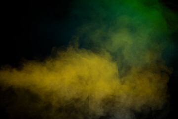 Blue and green steam on a black background.