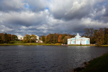 Fototapeta na wymiar Large pond overlooking the Grotto Pavilion and Cameron Gallery. Catherine Park. Tsarskoye Selo. Pushkin. Saint Petersburg. Russia