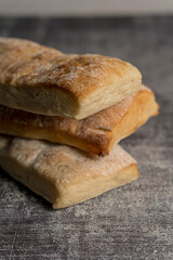 homemade bread ready to eat gray background