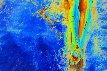 Passion, suffer, glory concept. Closeup of an old wooden crucifix on a stone wall in church. Passion of Jesus Christ. Easter holiday celebration. Religious Christian background. Grunge toned photo. 
