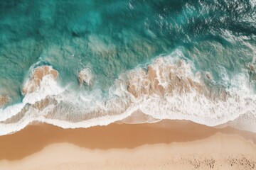 Fototapeta na wymiar Aerial View of Turquoise Waves Crashing on a Golden Beach