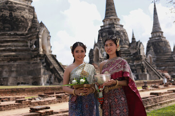 Asian women wearing typical (traditional)Thai dress, vintage original Thailand attire, identity...