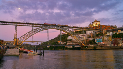 Fototapeta na wymiar Picturesque view of old town Porto, Portugal with bridge Ponte Dom Luis over Douro river.