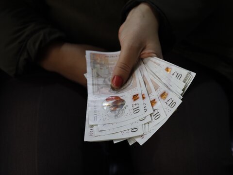 economy and finance with sterling banknotes