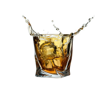 Whiskey splashing in glass isolated on white