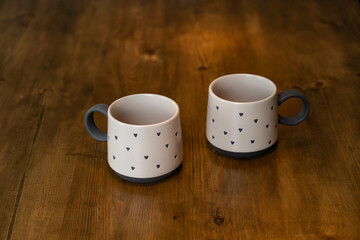Mug with coffee. A cup of tea. Cocoa in a cozy atmosphere.