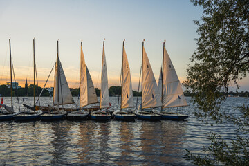 sailboats at sunset