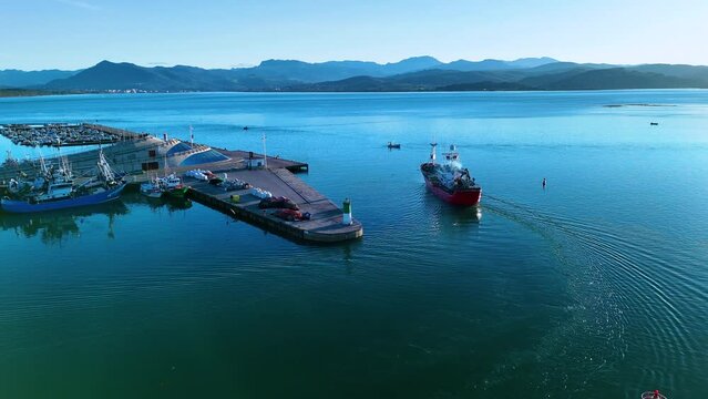 Fishing boats in the fishing village of Santo&ntilde;a in the Marismas de Santo&ntilde;a, Victoria y Joyel Natural Park. Cantabrian Sea. Santo&ntilde;a, Cantabria, Spain, Europe