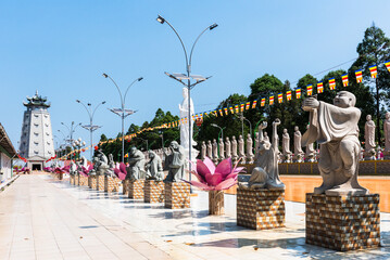 Sculptures near Buddhist temple, example of the amazing ancient architecture - Vietnam.