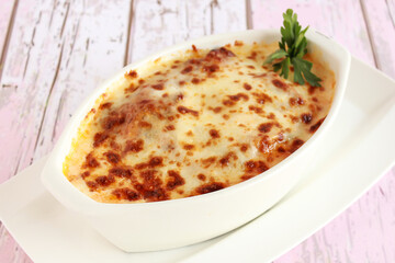 Baked Beef Lasagna Served in dish isolated on table closeup top view of italian food