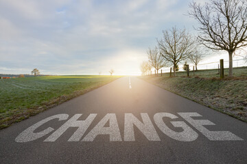 Change text written on road concept for business planning strategies and challenges or career path opportunities and change, road to success concept, Success word on street.