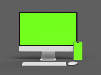 Render of desktop and phone with a green screen on a dark background.