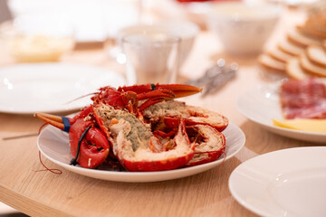 Red cooked lobster on a table.