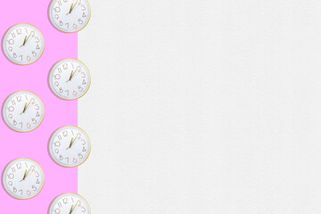 Border made with clock dials with, golden details. Bright pink and white paper with texture. Creative minimal art. Flat lay. Minimal composition. Creative concept with copy space. Border arrangement.