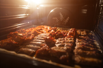 Pork ribs are cooked in the oven.