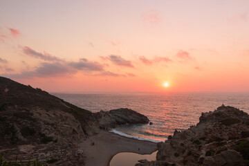 Amazing Nas beach with Chalares river bed and impressive canyon at sunset, Ikaria islands, Greece