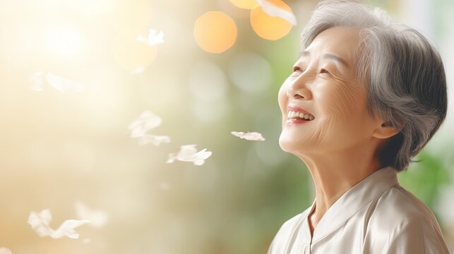 Graceful elderly Asian bride in a white wedding dress with serene smile. Concept of elegance, maturity, bridal beauty, joyous occasions, and cultural traditions. Banner with copy space