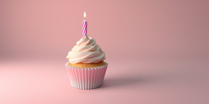 Birthday cupcake with a candle on a light pink background