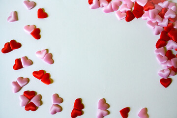 Valentines Day background. Red and pink hearts on white background. Copy space