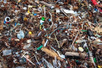 Beach disappears under rubbish and plastic