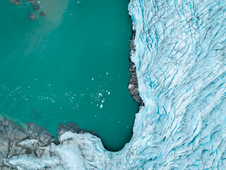 drone shot of an iceberg in Svalbard, a large piece of iceberg on the water in the middle of wild and frozen nature, usable for magazines and magazines, travel to arctic countries, Svalbard