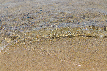 Wave hitting the beach