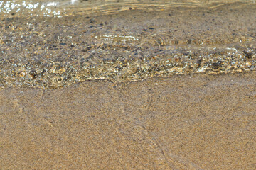 Wave hitting the beach