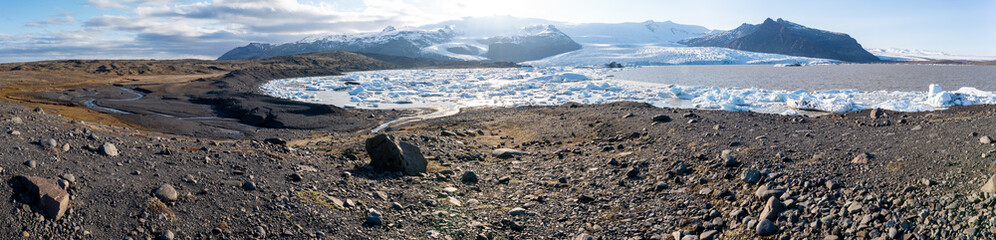 Panoramic view of melting ice on Jokulsarlon glacier in spring
