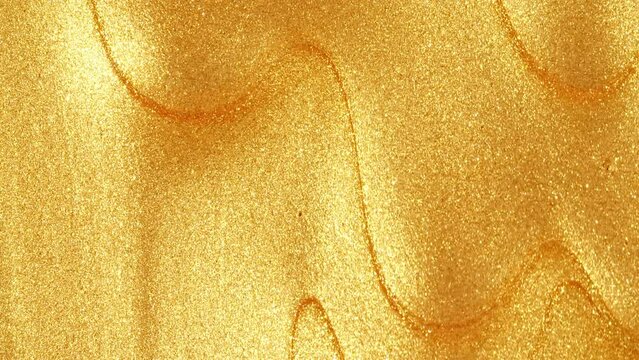 Golden Cosmetic Gel Fluid With Molecule Bubbles Flowing On The White Surface. Macro Shot. Liquid Cream Gel Transparent Cosmetic Sample Texture With Bubbles. High quality 4k footage