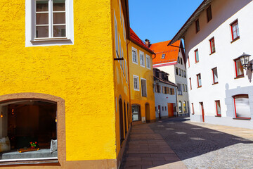 Fototapeta na wymiar Street in the old town of Fussen, Bavaria Germany. Typical colorful houses of European town