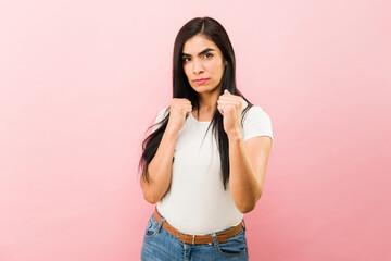 Upset angry woman ready for a fist fight
