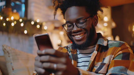 Happy man doing online shopping on smart phone through credit card - obrazy, fototapety, plakaty
