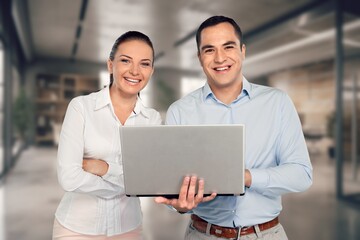 Two diverse business partners discussing project