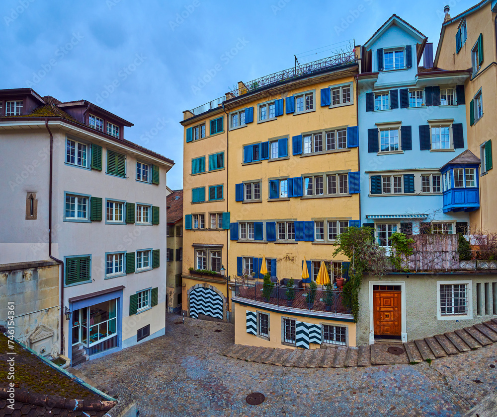 Canvas Prints The scenic residential houses on Romergasse street next to Grossmunster, Zurich, Switzerland