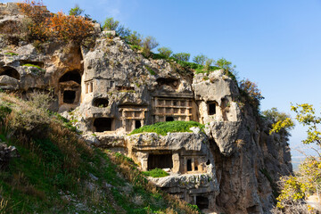Lycian graves carved into mountainside in ancient settlement of Tlos located near Fethiye town in Turkey