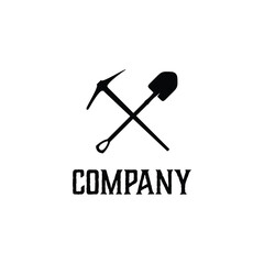 Crossed shovel and Pick axe logo design