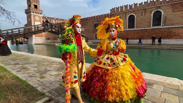Venice Carnival. People in Venetian carnival masks and costumes on streets of Venice, Italy, Europe February 10, 2024. High quality 4k footage
