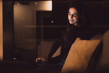 Stressed woman at late night having strong terrible neckache attack after computer laptop study,...