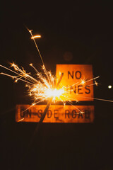 Sparkler with road sign 
